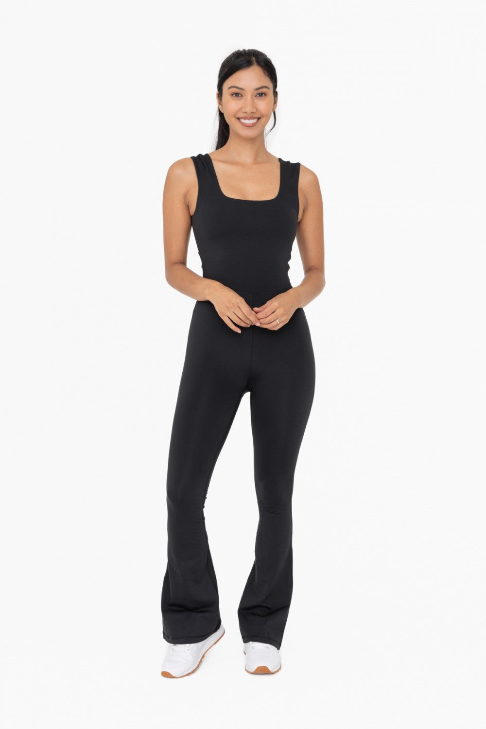 Our Laguna Twist Back Jumpsuit is designed to make you look and feel fabulous. Crafted with premium fabric and featuring a flare leg, open back, and square neckline, this jumpsuit flatters any figure. Not to mention, it comes with built-in bra support and thick, supportive straps for ultimate comfort and security. For the modern millennial woman, this jumpsuit is a must-have!      75% Polyester, 25% Spandex     True to Size fit, snug fit     Flare leg     Machine was cold, hang dry.