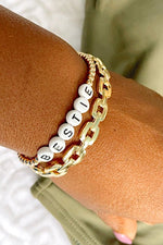 -Bestie Bead Bracelet-  This White & Gold Bead Bracelet is perfect for stacking bracelets! It's a great addition to your collection as the colors make it easy to match with most other bracelets.  Stretches to fit most.