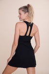 Back of black tennis dress with double strap back. Golf Tennis Athletic wear