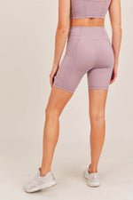 -Essential Biker Short- These mid thigh length shorts are great for sweaty gym sessions, biking or lounging around. -- Style hack: Wear these under dresses for an added layer for comfort or as a form of body shaping 71% Polyester, 29% Spandex. Wash cold, hang dry. Moisture wicking.