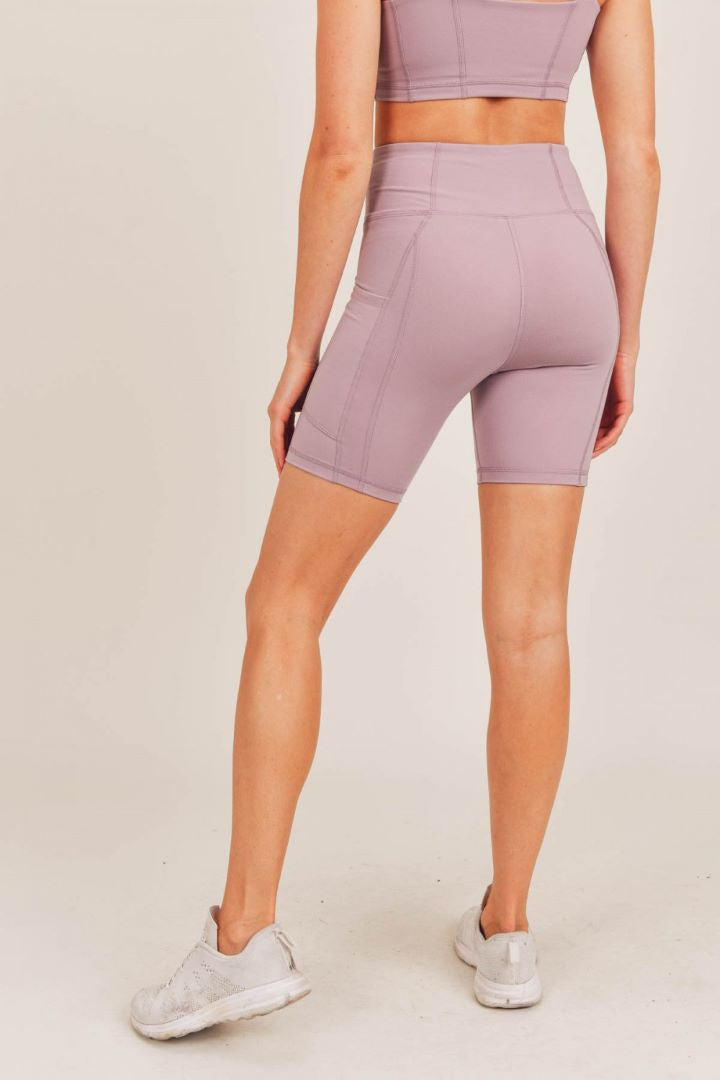 -Essential Biker Short- These mid thigh length shorts are great for sweaty gym sessions, biking or lounging around. -- Style hack: Wear these under dresses for an added layer for comfort or as a form of body shaping 71% Polyester, 29% Spandex. Wash cold, hang dry. Moisture wicking.