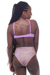 - Forever Wild Twist Top - Our Forever Wild Ruth twist bikini top is simple yet sophisticated. With an all-around clean-cut look, the front twist elevates this top.  In our African Violet, this top is flattering on most! Gear up for your next vacation with this stunning bikini top. Finish off your look with one of our Forever Wild bikini bottoms!