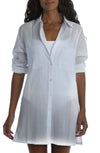 White cotton button down shirt worn as a cover up. Goes to mid thigh in length