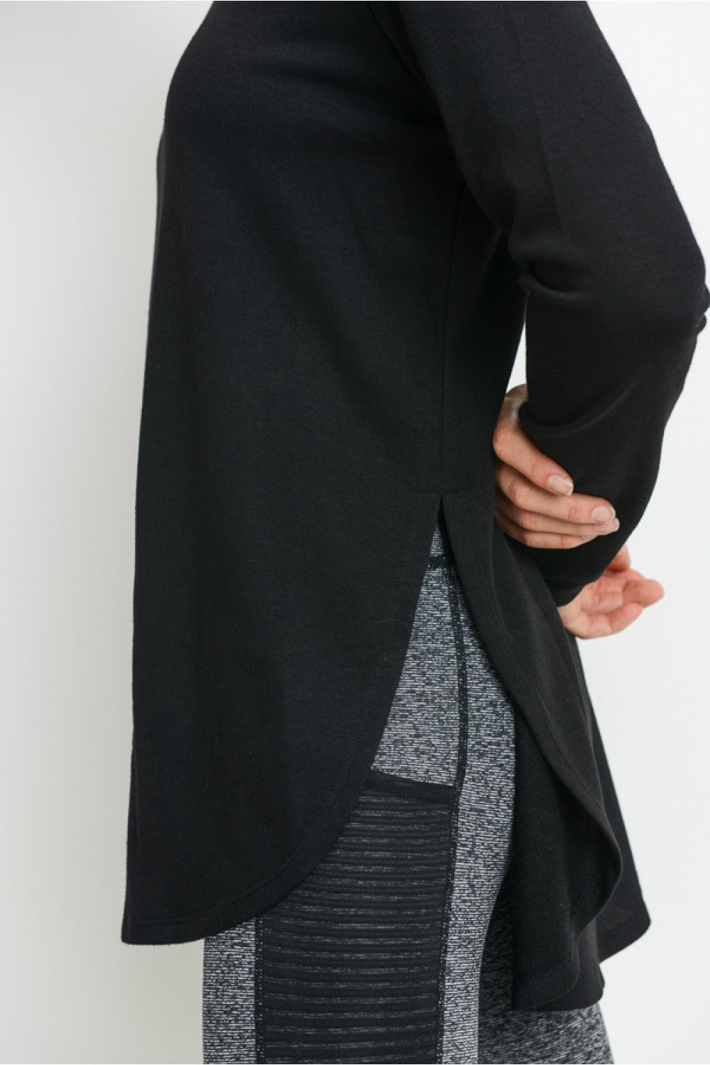 -Abby Side Slit Tunic-  You want to add this to your wardrobe basics. This longer length tunic is versatile to dress up or down. The side slits add just the right amount of detail and style.  70% Polyester, 30% Viscose Machine wash cold, hang dry or tumble dry Fit: Runs to to size in Womens. Loose fit.